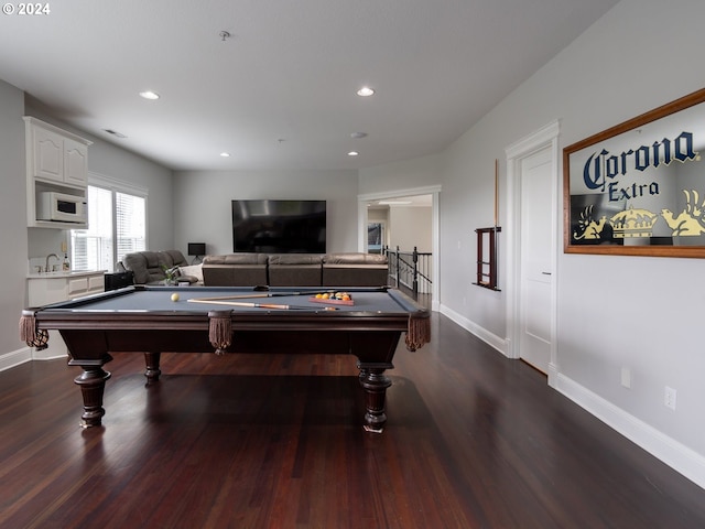 playroom featuring dark hardwood / wood-style floors and pool table