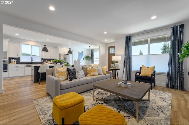 living room featuring light wood-type flooring