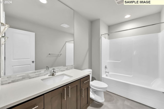 full bathroom with vanity, toilet, shower / tub combination, and backsplash