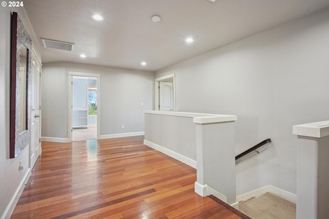 hallway featuring hardwood / wood-style floors