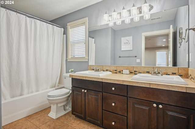 full bathroom with shower / tub combo, backsplash, toilet, vanity, and tile patterned flooring