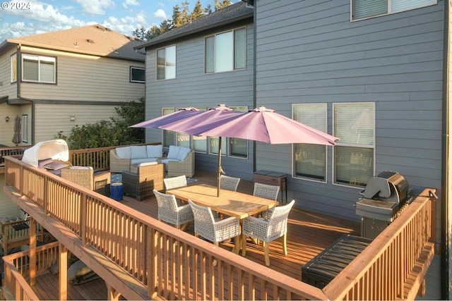 deck with an outdoor living space and area for grilling