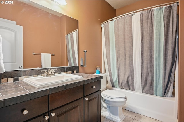 full bathroom with vanity, tile patterned floors, toilet, and shower / bathtub combination with curtain