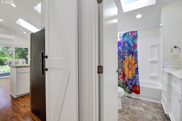 24221 Warthen Rd, Elmira, OR 97437 - bathroom featuring a skylight, toilet, a wall unit AC, recessed lighting, and shower / bath combo with shower curtain