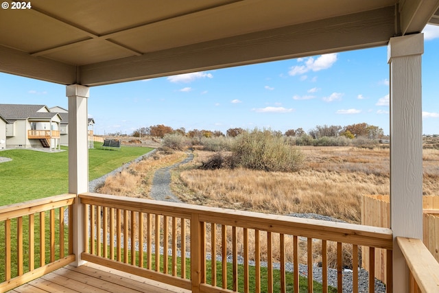 deck featuring a lawn