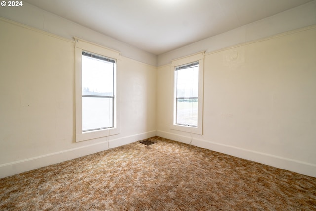 view of carpeted spare room