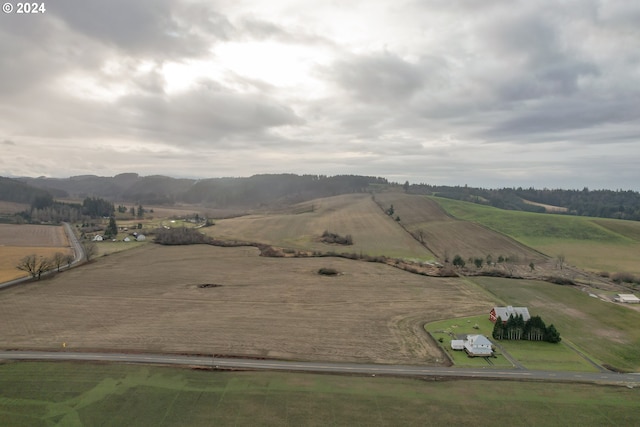 birds eye view of property featuring a rural view