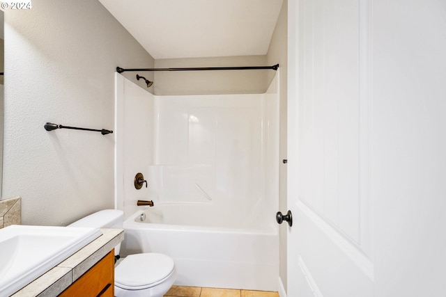 full bathroom with vanity, toilet, bathtub / shower combination, and tile patterned floors