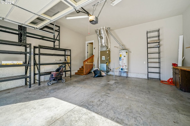 garage with strapped water heater and a garage door opener