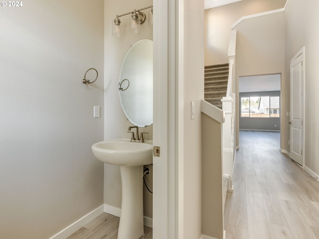 bathroom featuring hardwood / wood-style flooring and sink