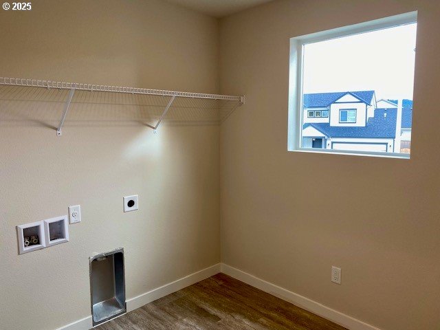 laundry area featuring hookup for a washing machine, electric dryer hookup, and hardwood / wood-style flooring