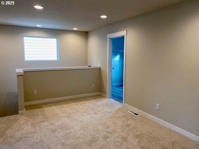 view of carpeted spare room