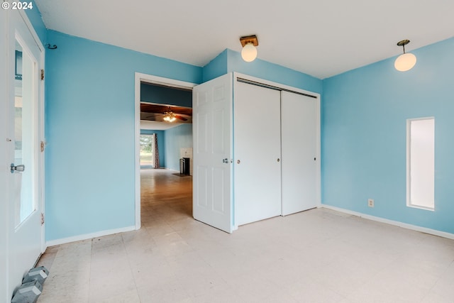 unfurnished bedroom with a closet