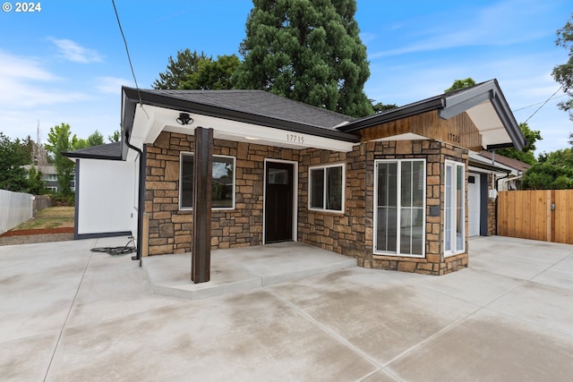 back of property featuring a patio area