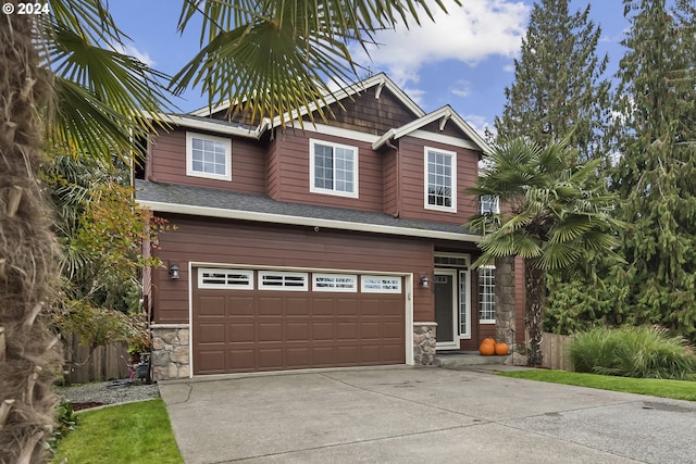 craftsman house with a garage