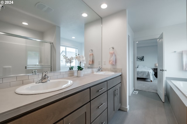 bathroom featuring vanity and walk in shower