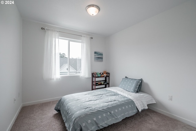 bedroom featuring carpet flooring