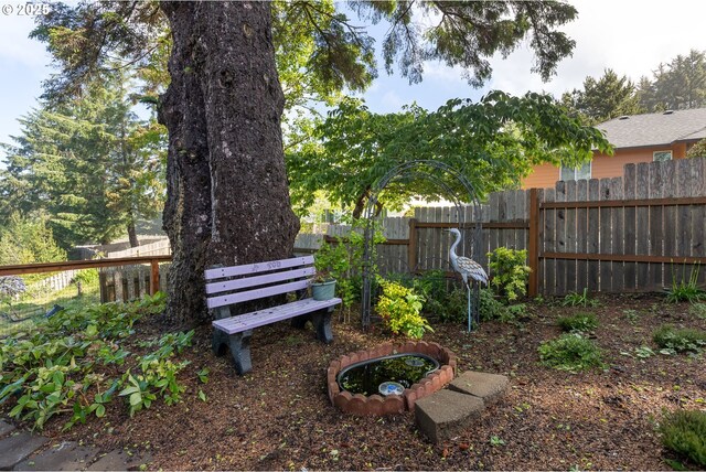 view of yard featuring fence