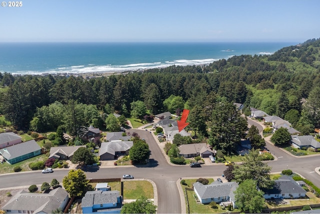 birds eye view of property featuring a residential view and a water view