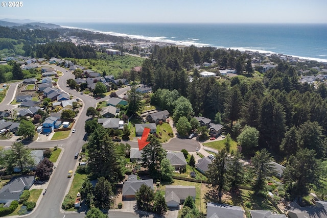 aerial view featuring a residential view and a water view