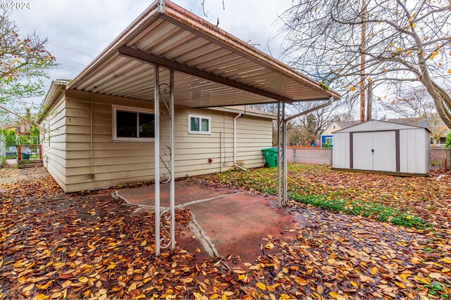 view of patio / terrace with a storage shed