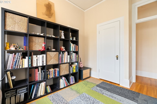 living area with hardwood / wood-style floors