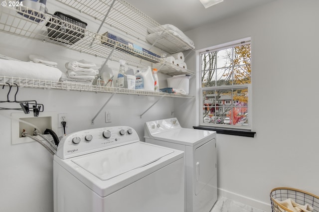 laundry room featuring washing machine and dryer