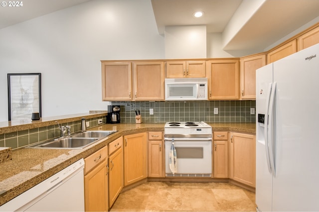 kitchen featuring sink, light brown cabinets, white appliances, decorative backsplash, and light tile patterned floors