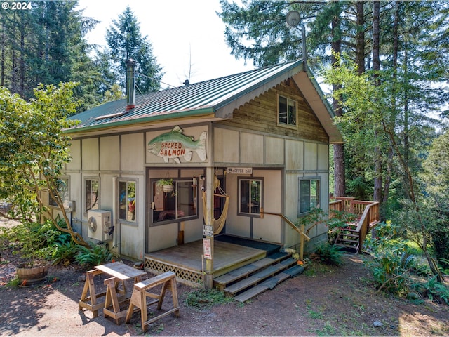 view of outdoor structure with ac unit