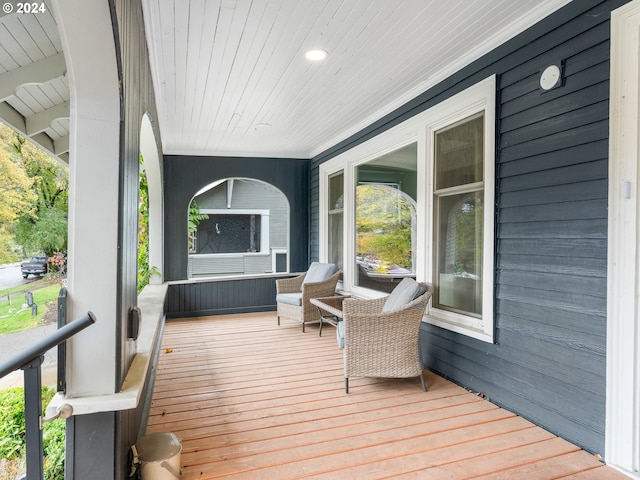 wooden deck featuring covered porch