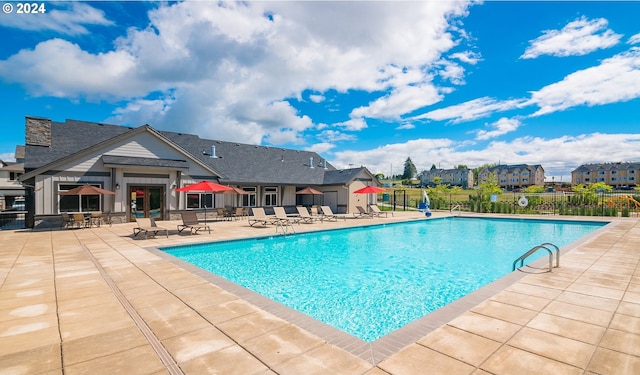 view of pool with a patio