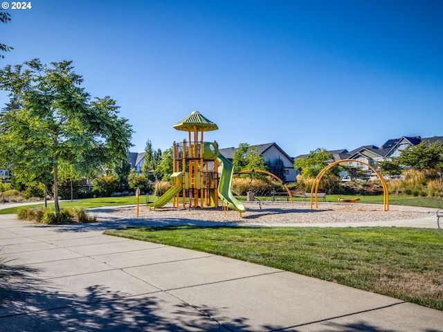 view of jungle gym with a yard