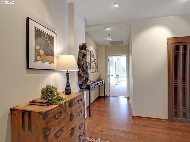 hallway featuring dark hardwood / wood-style floors