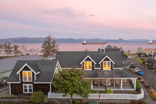 view of front facade featuring a mountain view