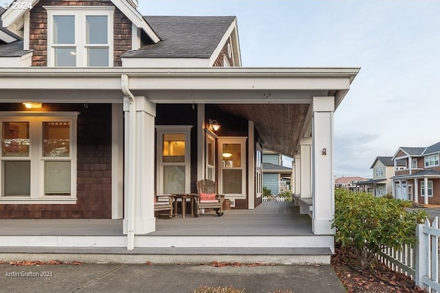285 23rd St, Astoria, OR 97103 - doorway to property featuring covered porch and roof with shingles