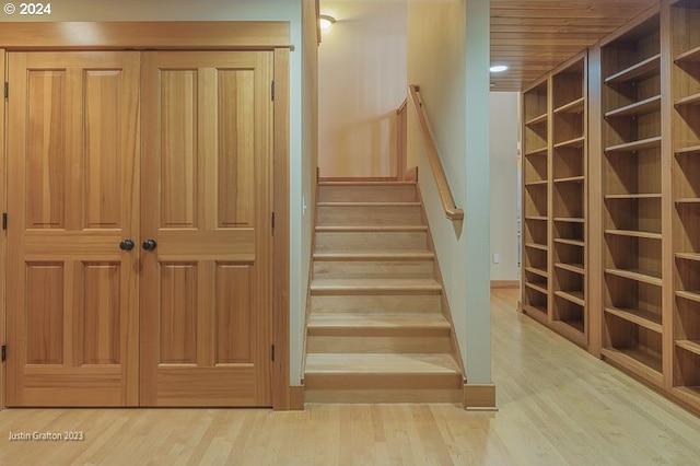 285 23rd St, Astoria, OR 97103 - stairs featuring wood finished floors, baseboards, and wooden ceiling