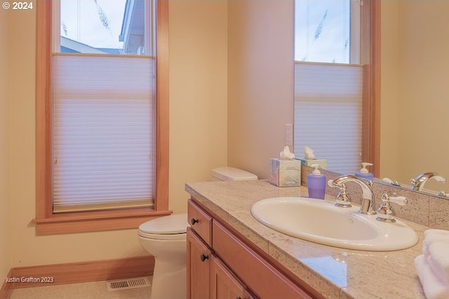 285 23rd St, Astoria, OR 97103 - half bathroom with vanity and toilet