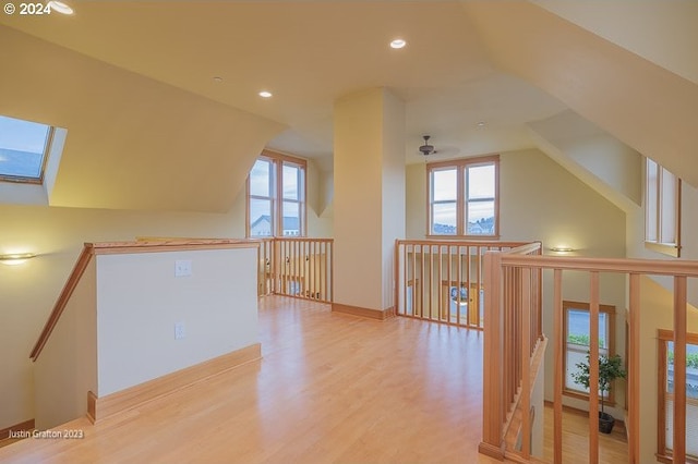 285 23rd St, Astoria, OR 97103 - additional living space featuring wood finished floors, lofted ceiling, a skylight, recessed lighting, and a ceiling fan