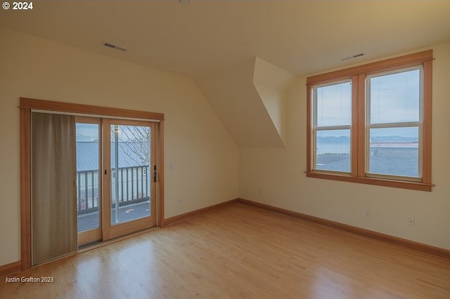 285 23rd St, Astoria, OR 97103 - additional living space featuring wood finished floors, baseboards, and lofted ceiling