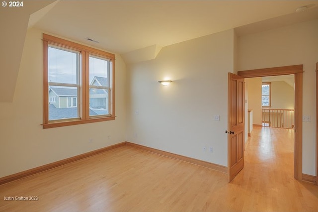 285 23rd St, Astoria, OR 97103 - empty room featuring light wood-style flooring and baseboards