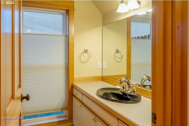 285 23rd St, Astoria, OR 97103 - bathroom featuring vanity and plenty of natural light