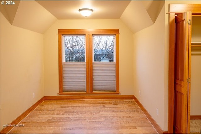 285 23rd St, Astoria, OR 97103 - bonus room featuring vaulted ceiling, light wood-type flooring, and baseboards