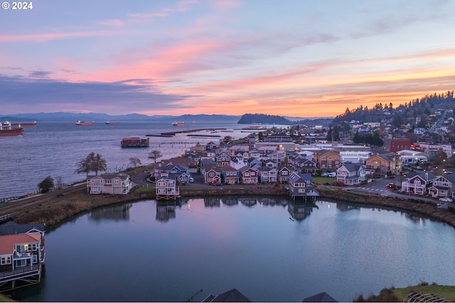 285 23rd St, Astoria, OR 97103 - water view featuring a mountainous background and nearby suburban area