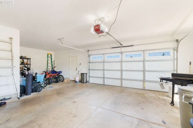 garage featuring a garage door opener