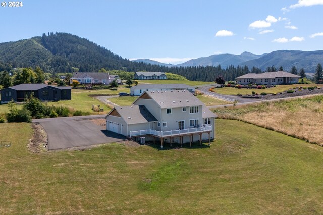 bird's eye view with a mountain view