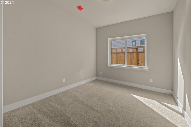 spare room with carpet flooring