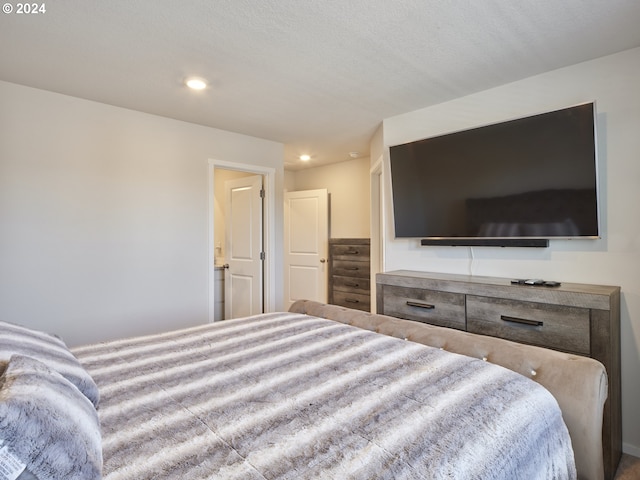 bedroom with a textured ceiling