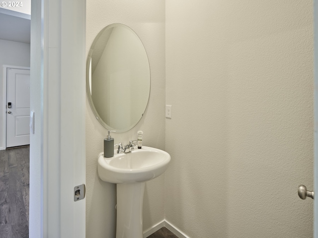 bathroom featuring hardwood / wood-style flooring