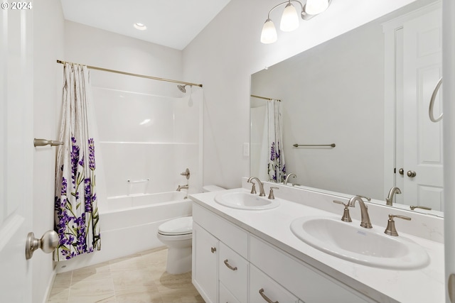 full bathroom featuring shower / bath combo, vanity, and toilet