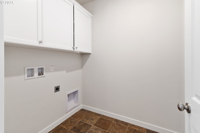 laundry area with cabinets, electric dryer hookup, and washer hookup